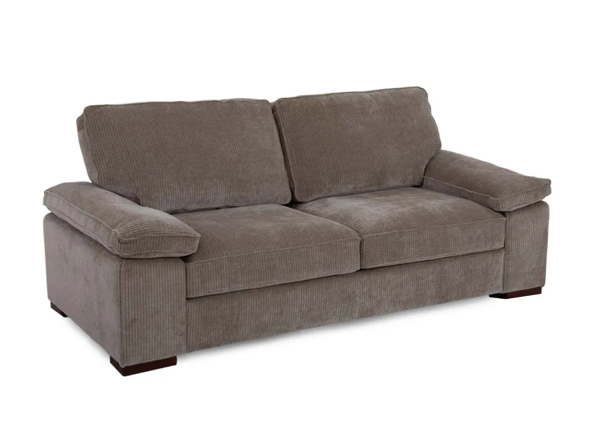 A 3 seater beige sofa in cord fabric from EZ Livings Westport range. Angled view of padded seat arm and back cushions.