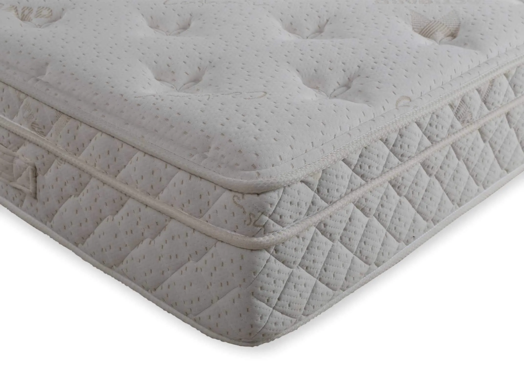 A close up image of the side of the Majesty Cashmere 6 foot super king mattress on a bed frame.