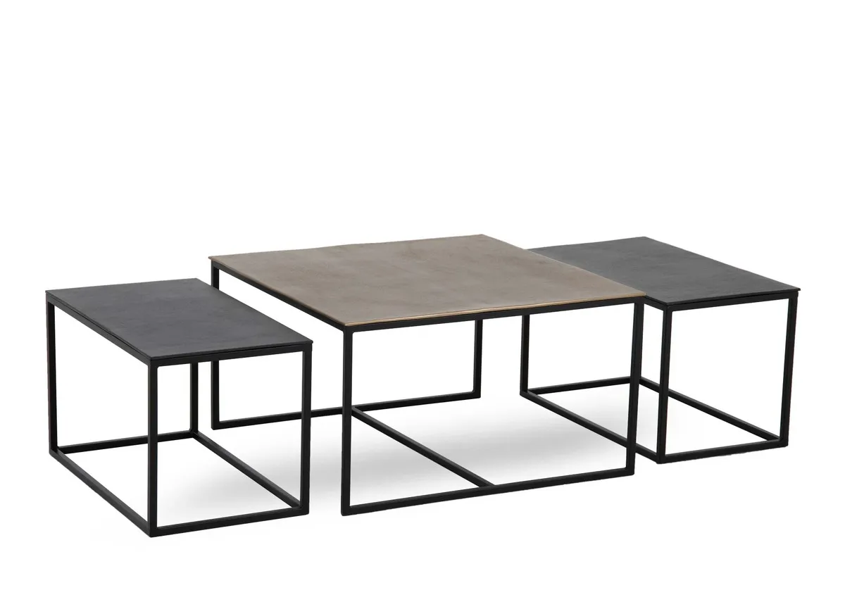 A nest of 3 rectangular coffee tables from EZ Livings Joyo range.Angled view of large brass and 2 smaller black tables