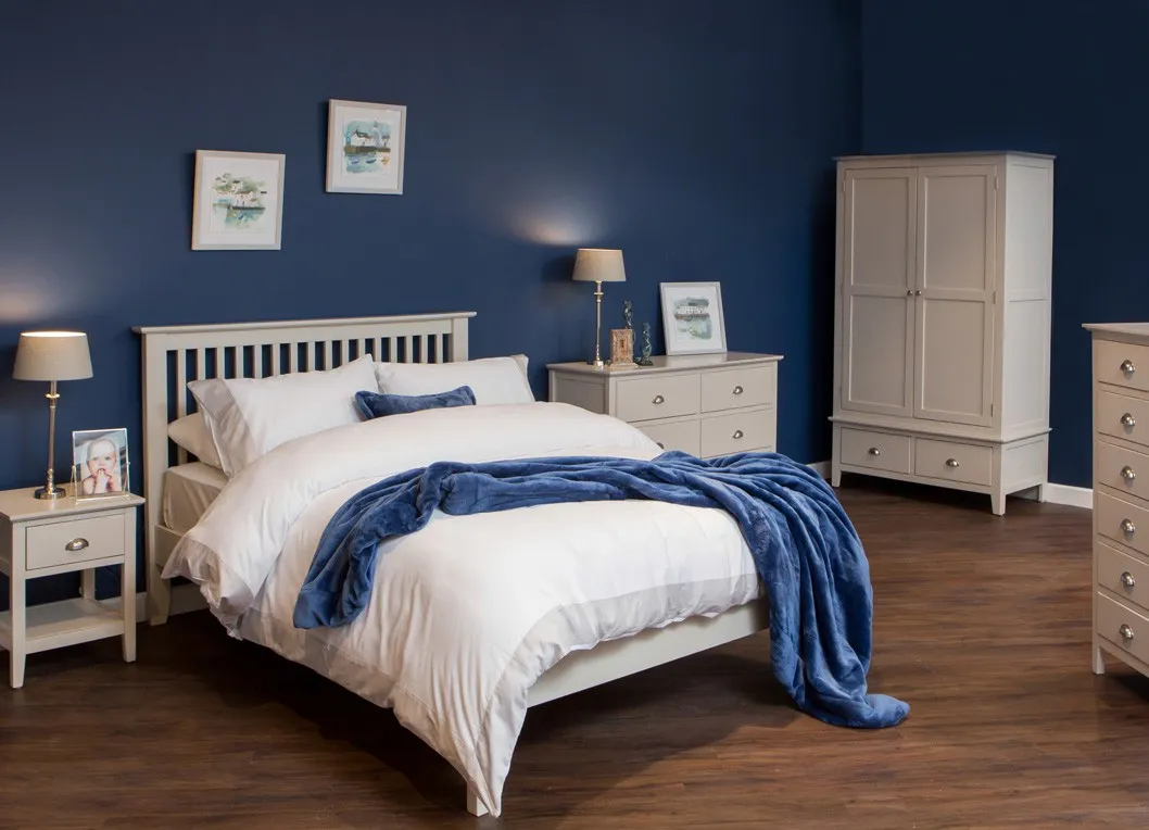View of front and side of one-drawer grey bedside locker with bottom shelf Maine