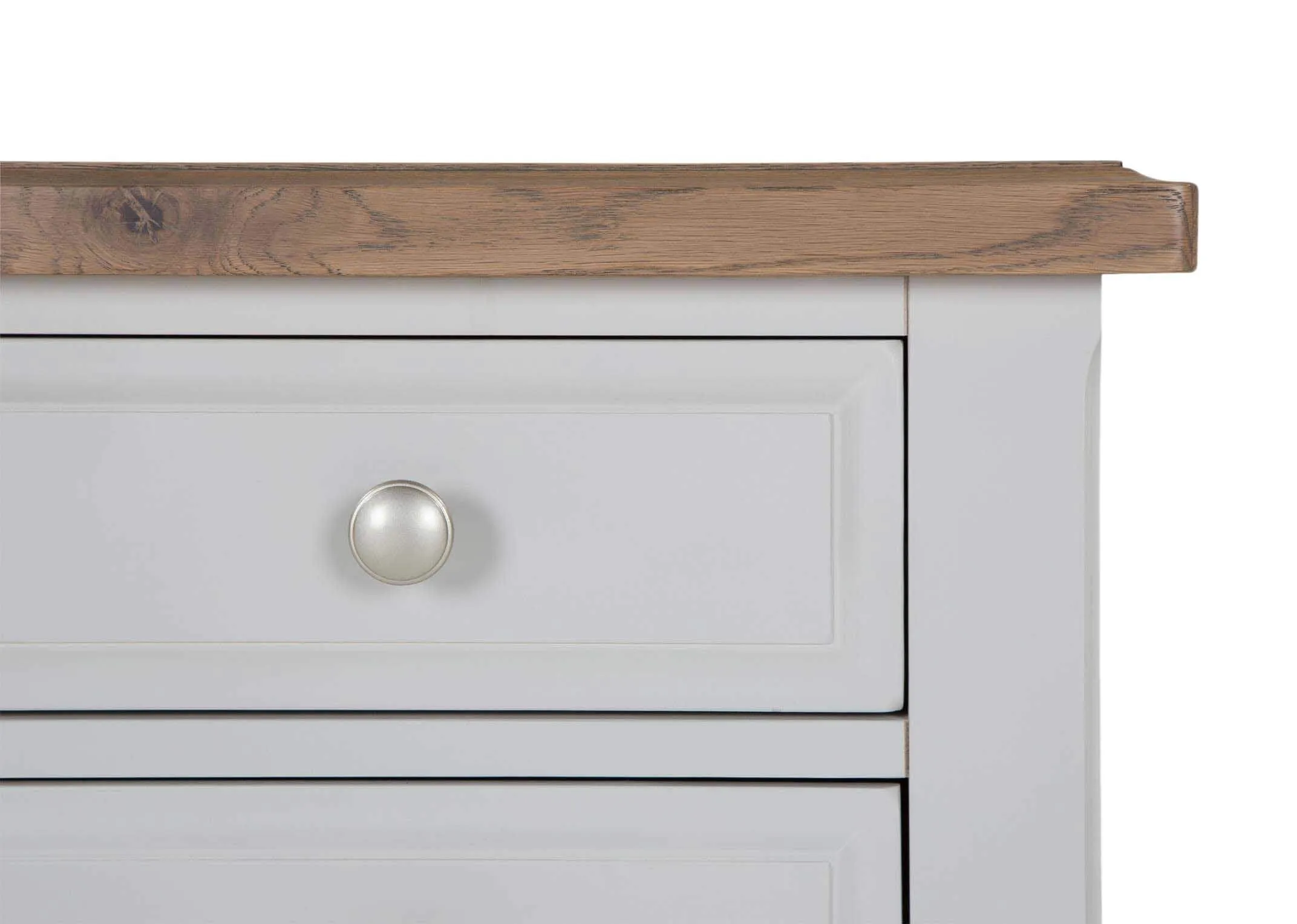 Detailed view of front of three-drawer grey oak bedside locker with light-coloured wooden top Georgia