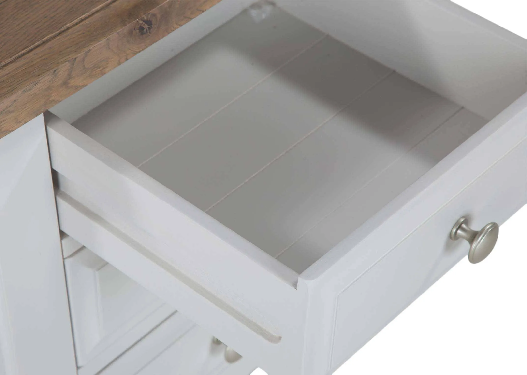 Detailed view of drawer and its interior of three-drawer grey oak bedside locker with light-coloured wooden top Georgia