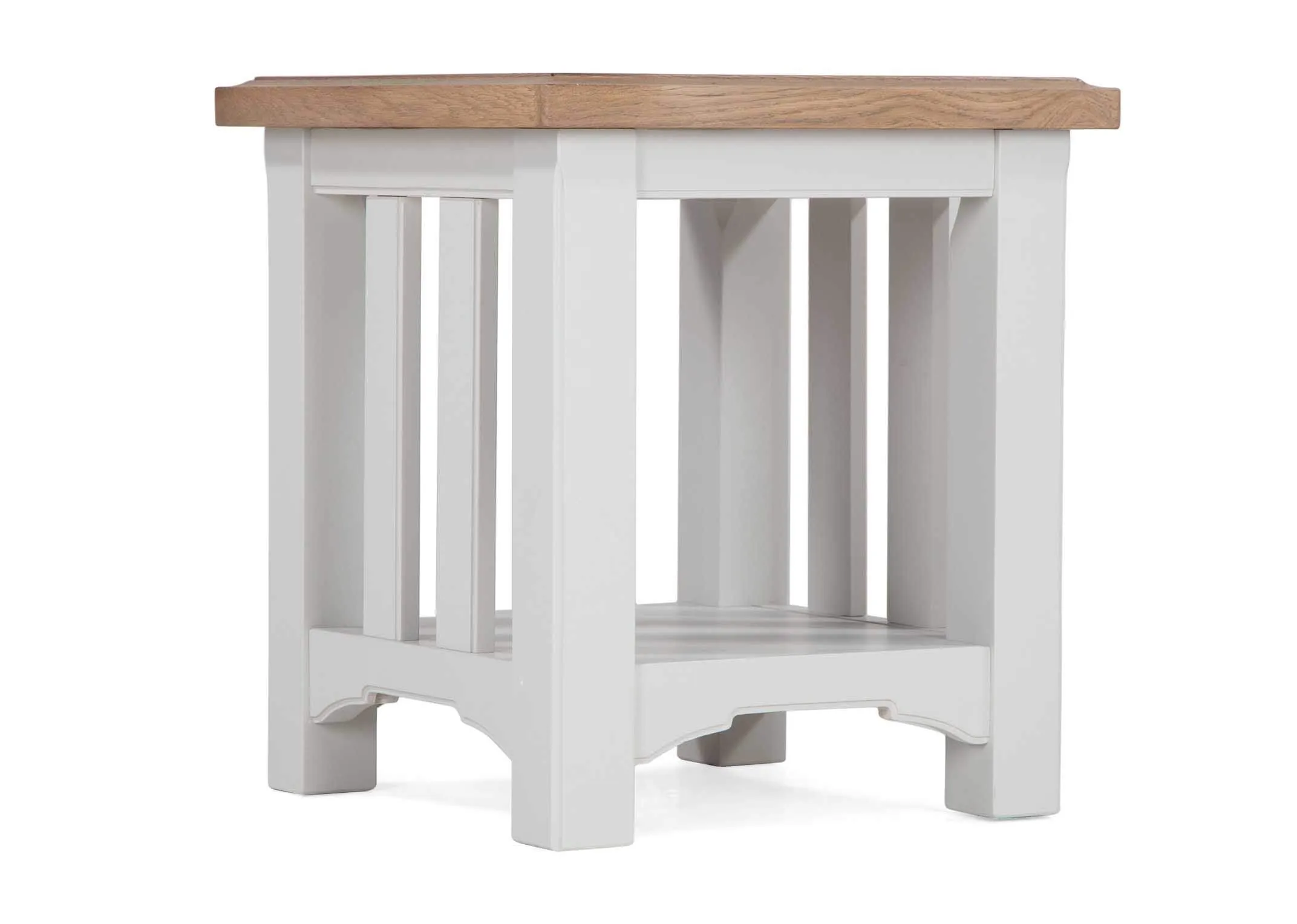 An angled shot of the grey solid oak Georgia lamp table with bottom shelf.