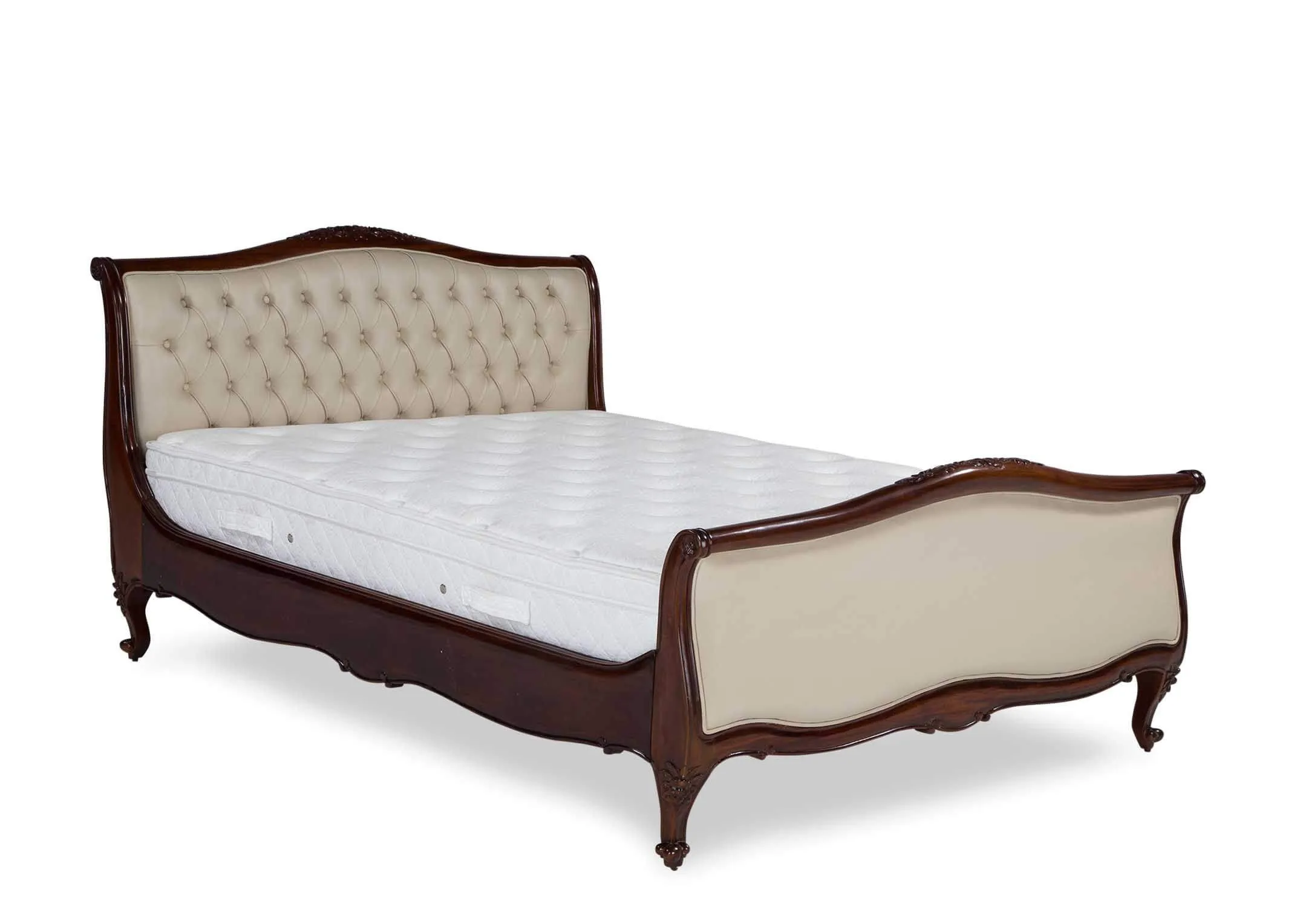 Angled shot of the Lyon two-tone super king size mahogany wood and cream leather bedframe with curved feet