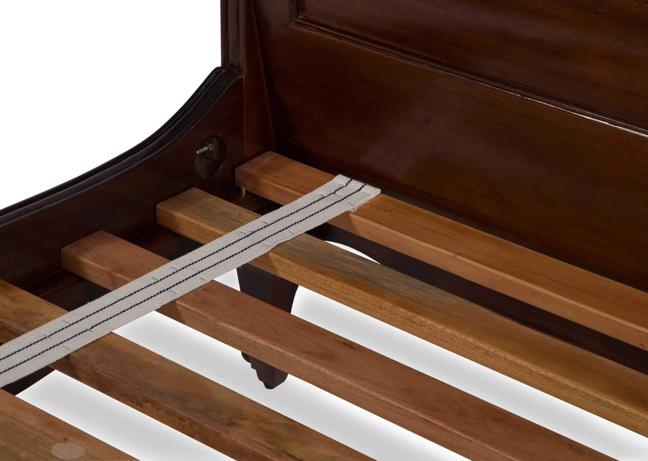 Detailed view of corner of the Lyon two-tone king size mahogany wood and cream leather bedframe with curved feet
