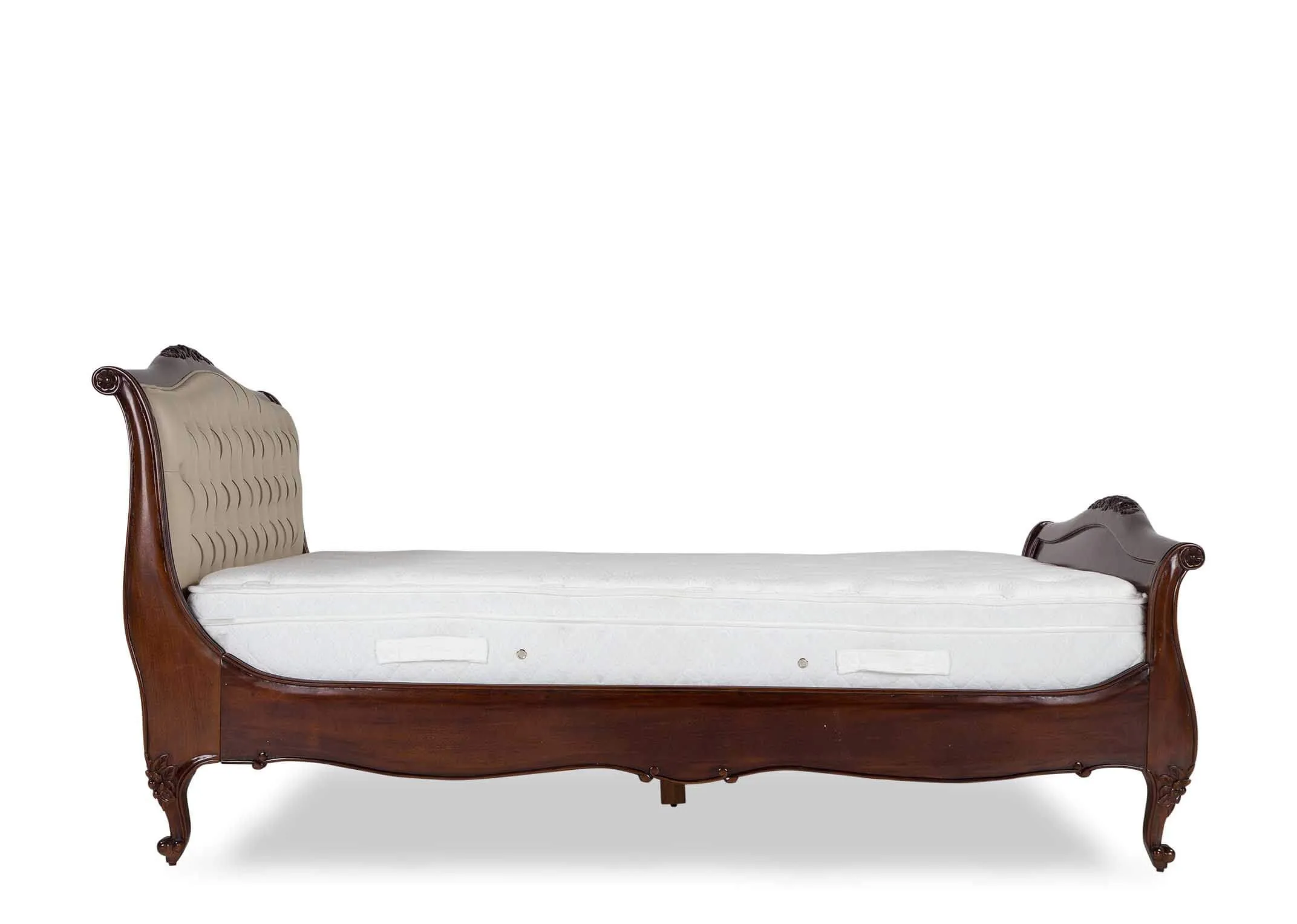 Side view of the Lyon two-tone king size mahogany wood and cream leather bedframe with curved feet