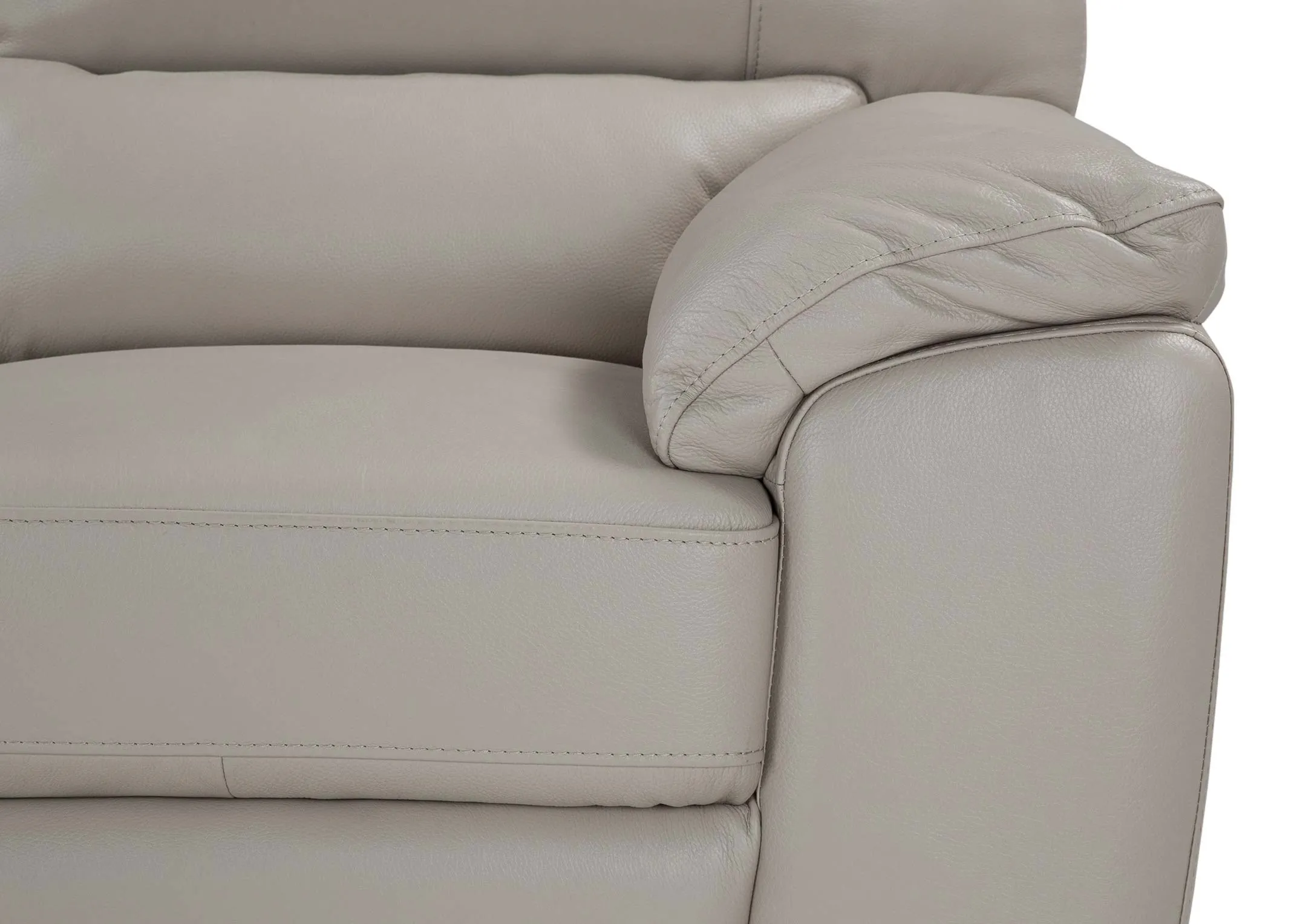 A close up of the armrest on the Alfredo sofa highlighting the light grey leather upholstery.