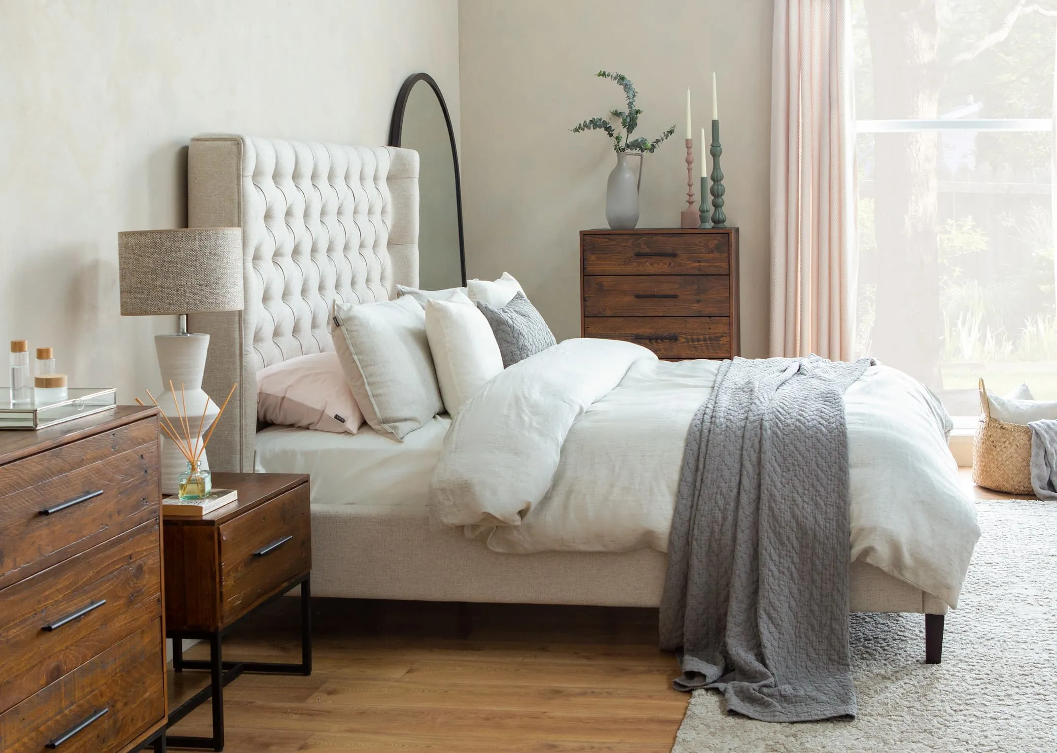 A lifestyle image of the Chelsea Linen Bedframe with Chicago Chest