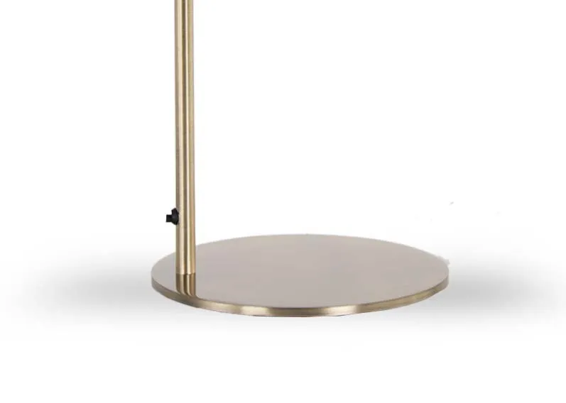 A lifestyle image of the Rakel lamp off with Livorno Sideboard and a selection of art