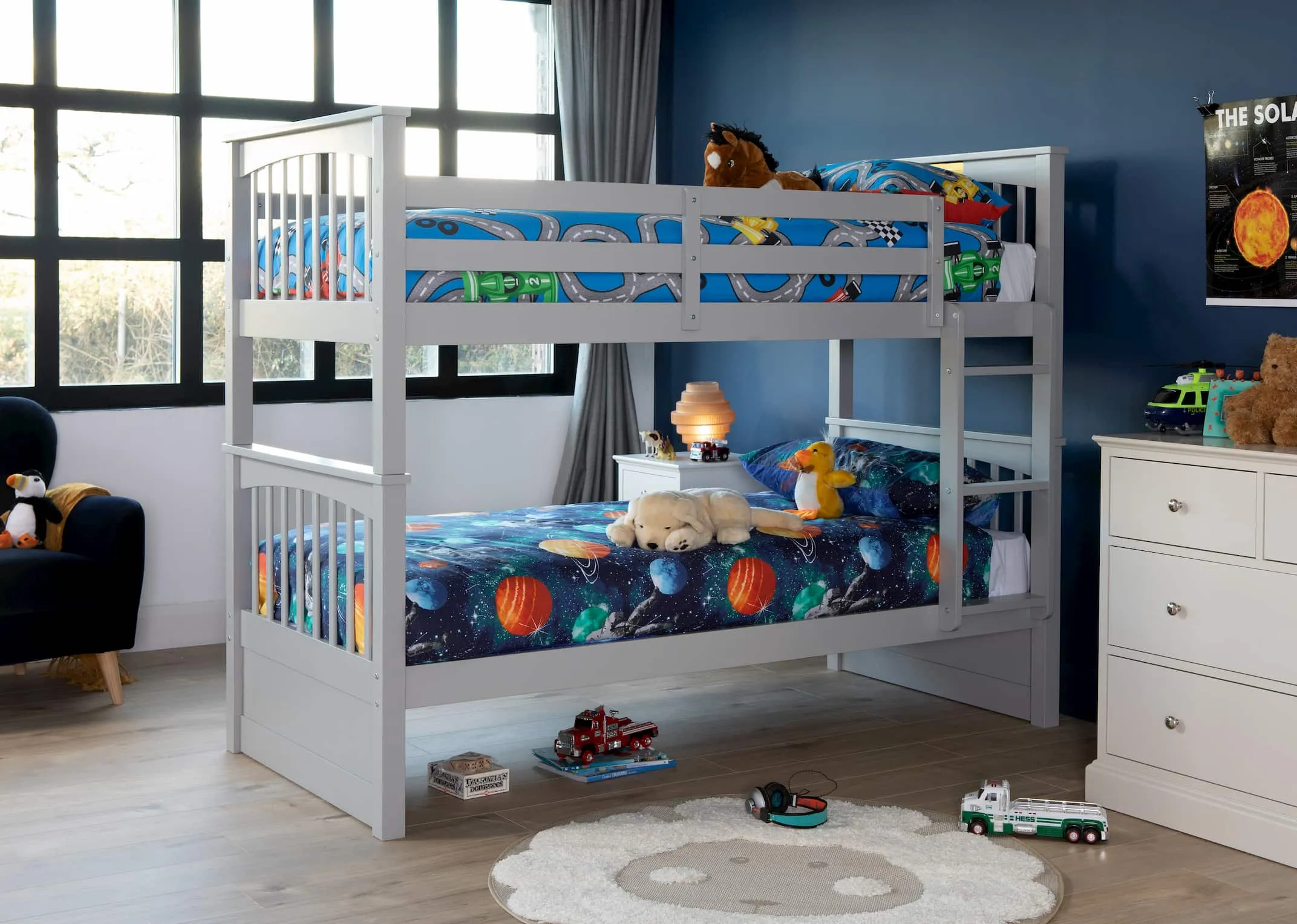 A lifestyle image of the Lara Single Grey Bunk beds with sheep rug