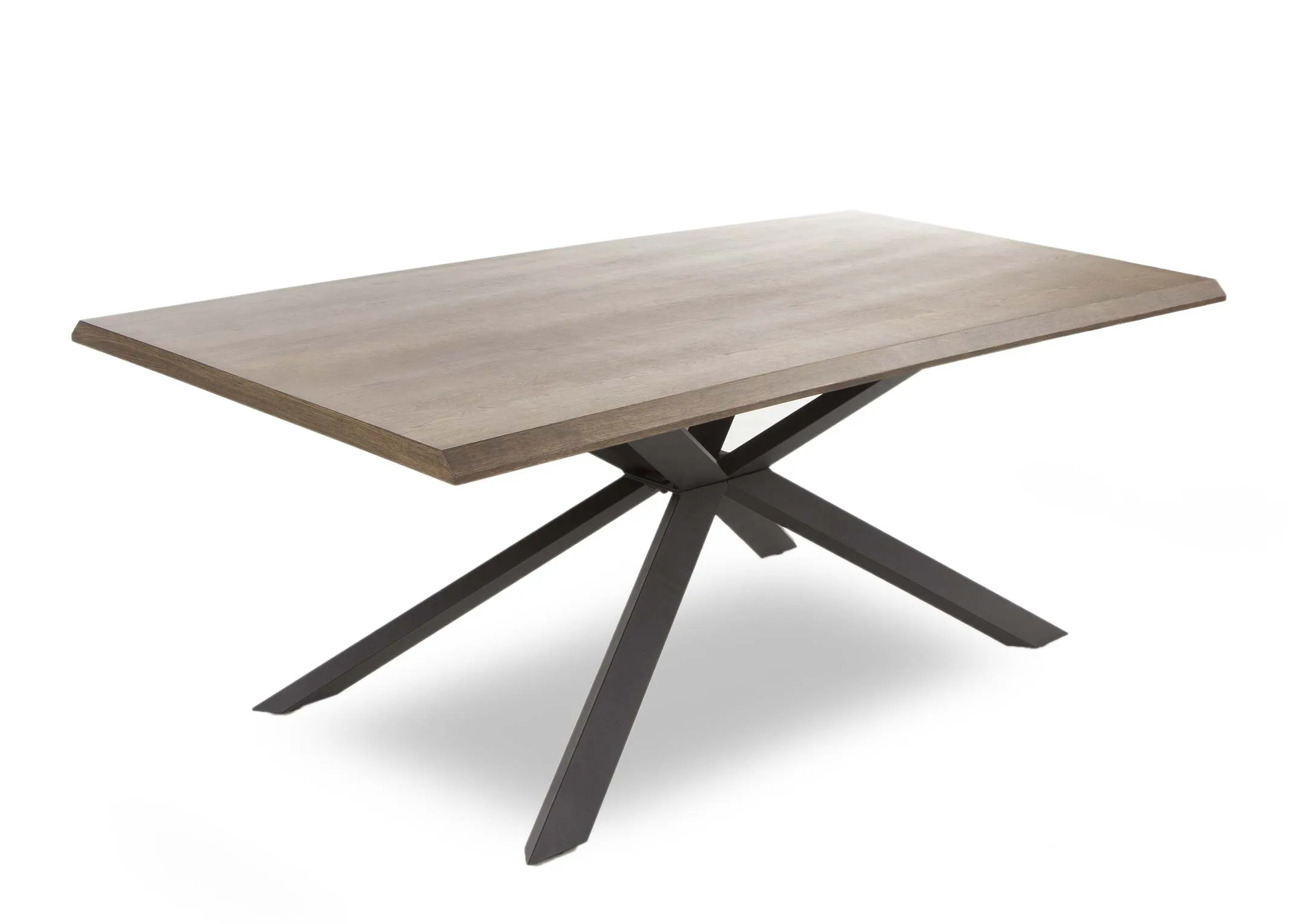 A smoked oak dining table with black x legs from EZ Living Furniture's Arno Range. Angled view of wood finish