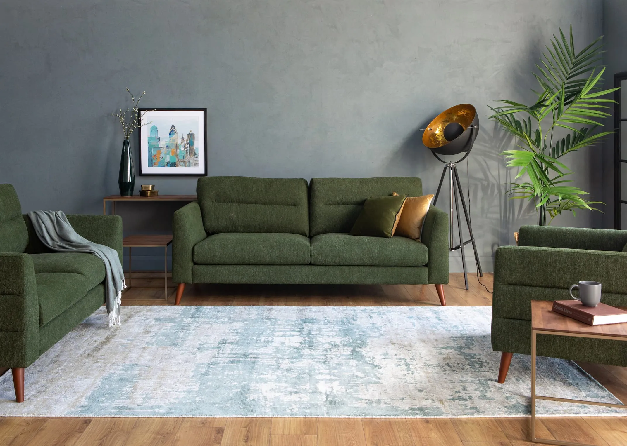 A lifestyle image of the Presley Fabric Sofa range with cosmos lamp & modesto rug with aston furniture