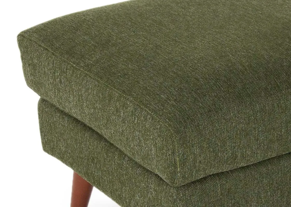 A small green fabric footstool with wood feet from EZ Living's Presley range. Closeup of fabric