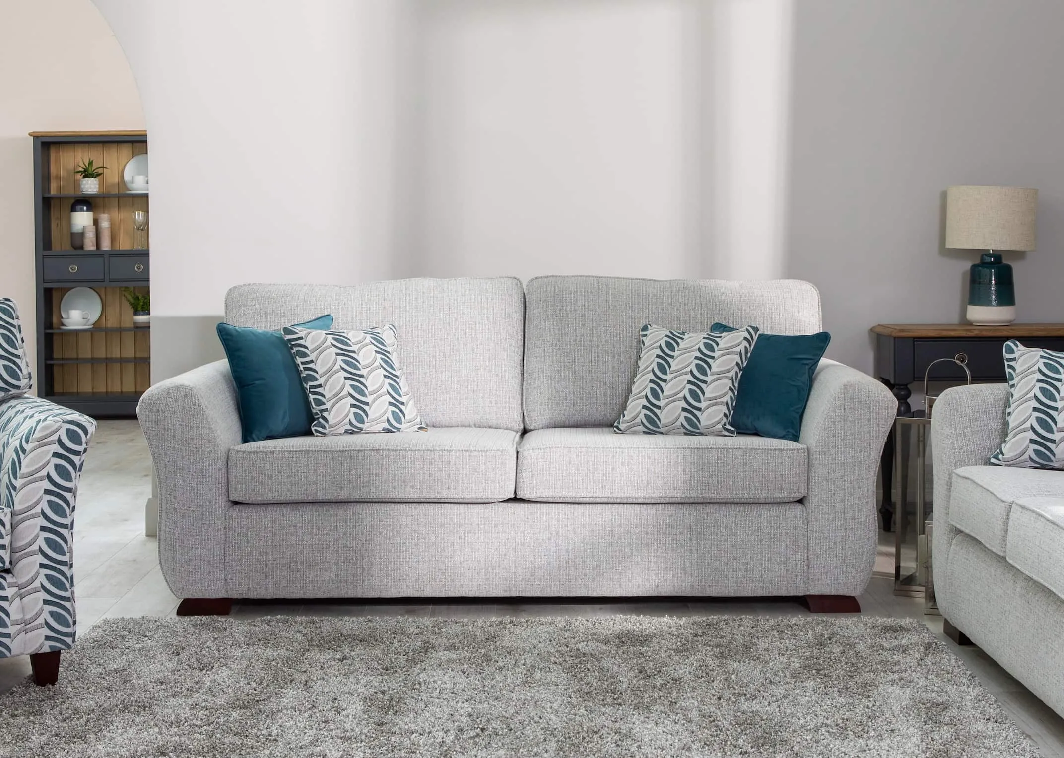 A lifestyle image of the Kilronan sofa range with oberon rug & toulouse console table.