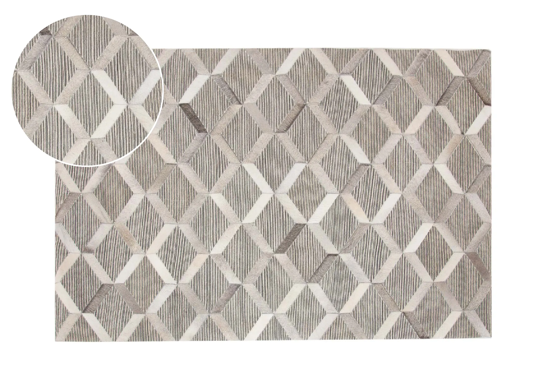 A silver grey geometric hair on Hyde rug from EZ Livings Corbit range. Front view with closeup shows pattern and hide hair texture.