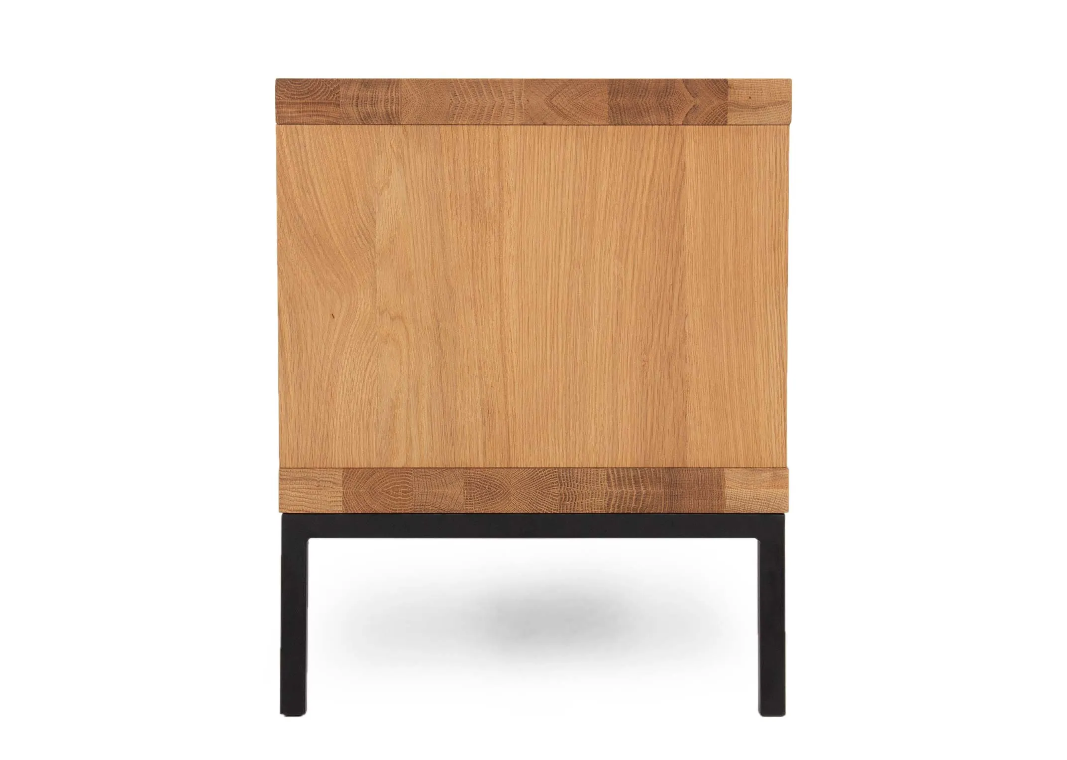 A 2 door 2 shelf oak tv unit from EZ Livings Renvyle range. Front view of unit with doors closed showing finish
