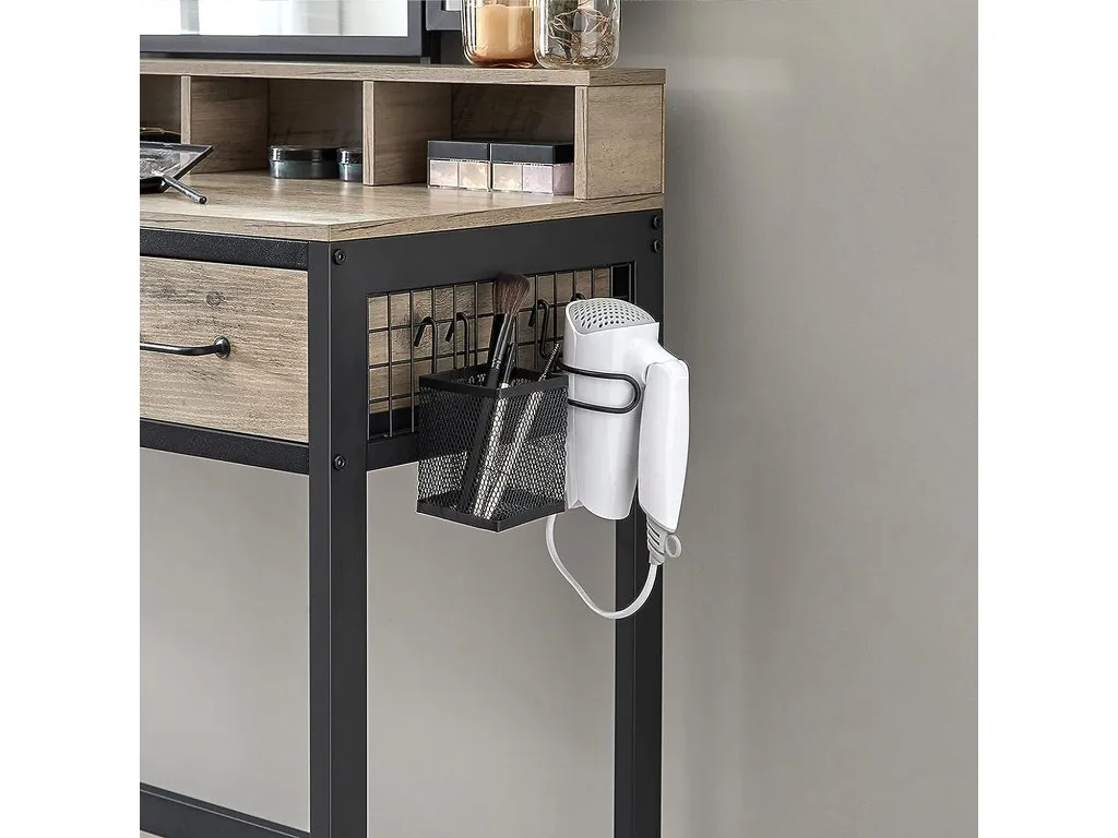 A lifestyle image of the Orwell grey dressing table with hooked containers on side to store brushes and hairdryers.