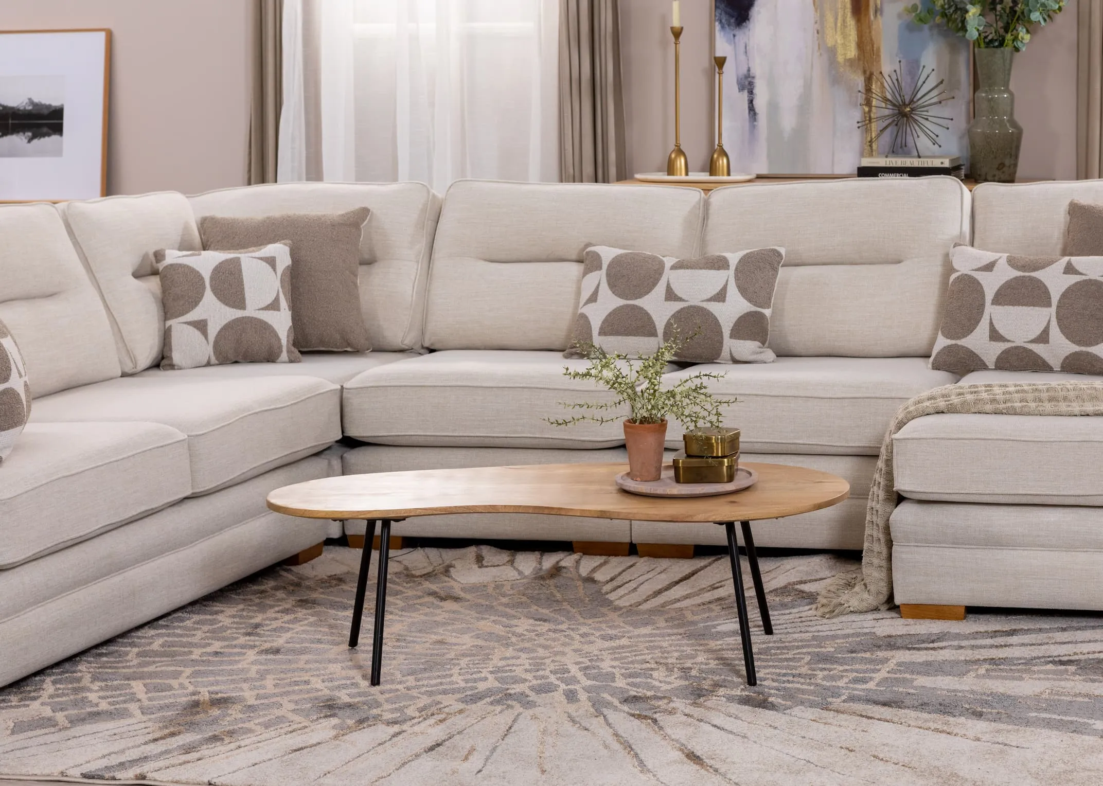 A lifestyle image of the Brianna corner sofa with the Mango oblong coffee table.