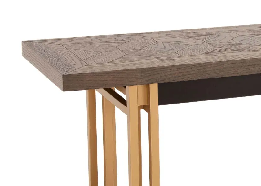 A dark oak table top with gold metal base from EZ Livings Greenwich range. Closeup of herringbone