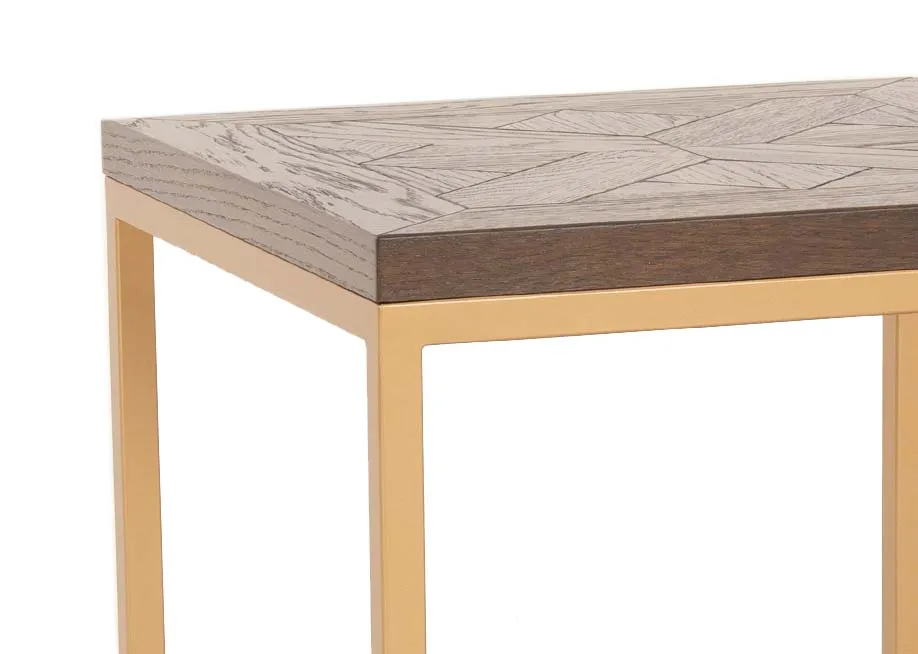 A gold metal framed lamp table with dark wood top from EZ Livings Greenwich range. Closeup of detail wood top.