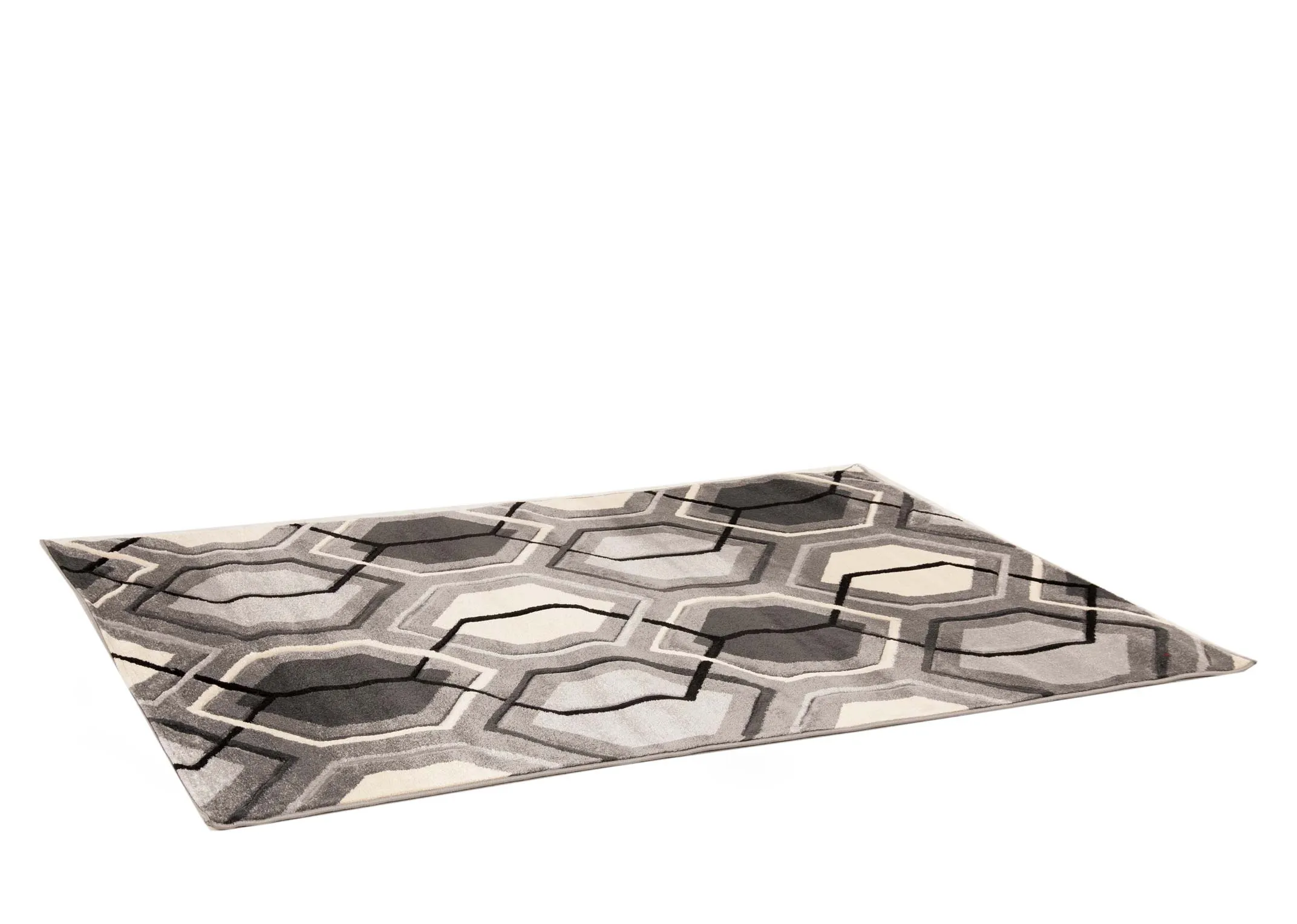 A grey rug with cream and black octagon pattern design from EZ Livings Forma range. Closeup of underlay