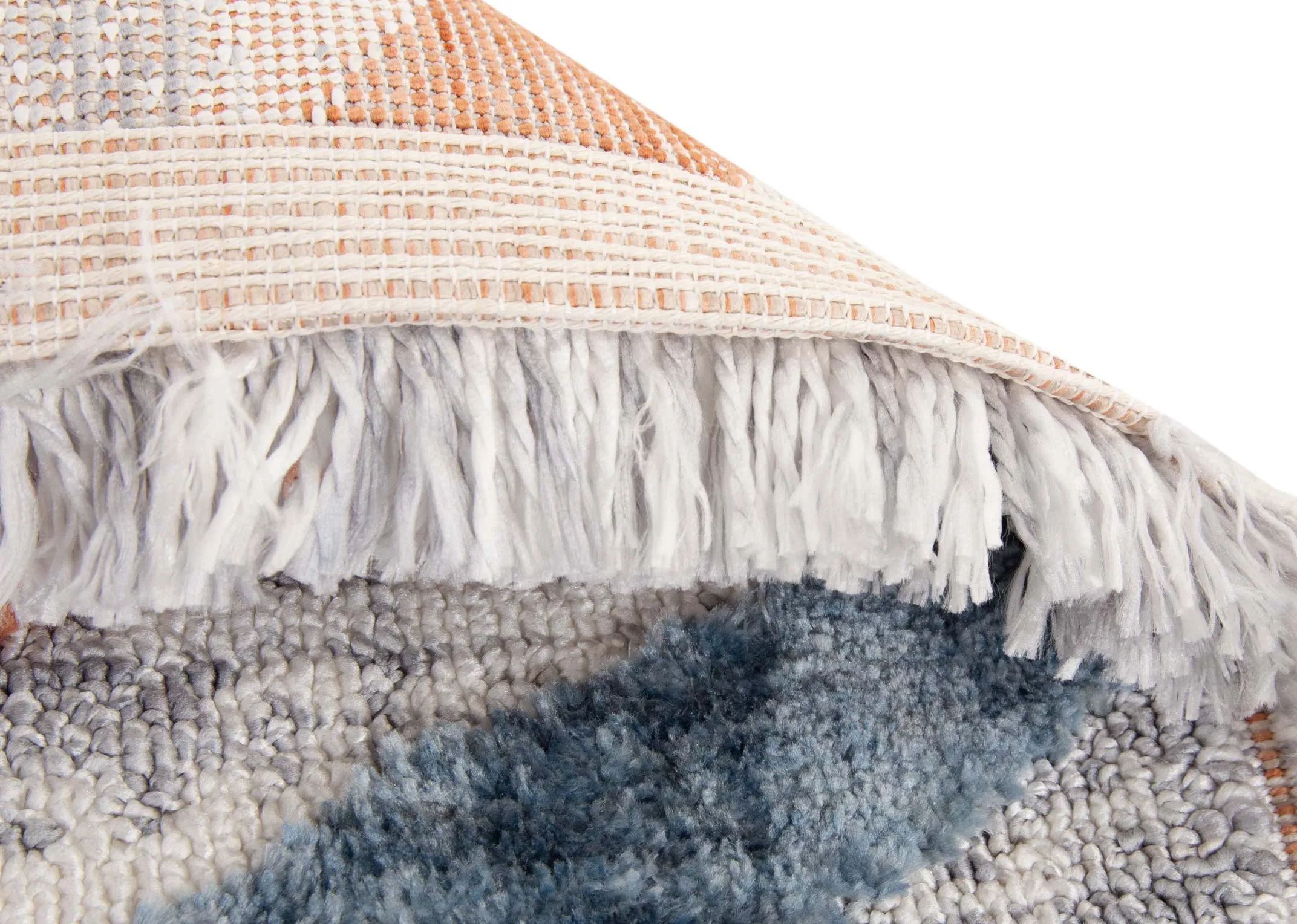 A grey rug with red yellow blue and white stripes in 2 x shapes from EZ Livings Gatsby range. Closeup of light underlay