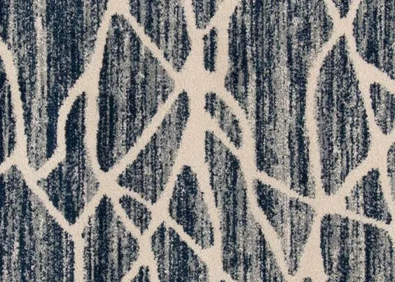 A navy blue rug with cream cracked pattern from EZ Livings Grotto range. Closeup of cream apttern
