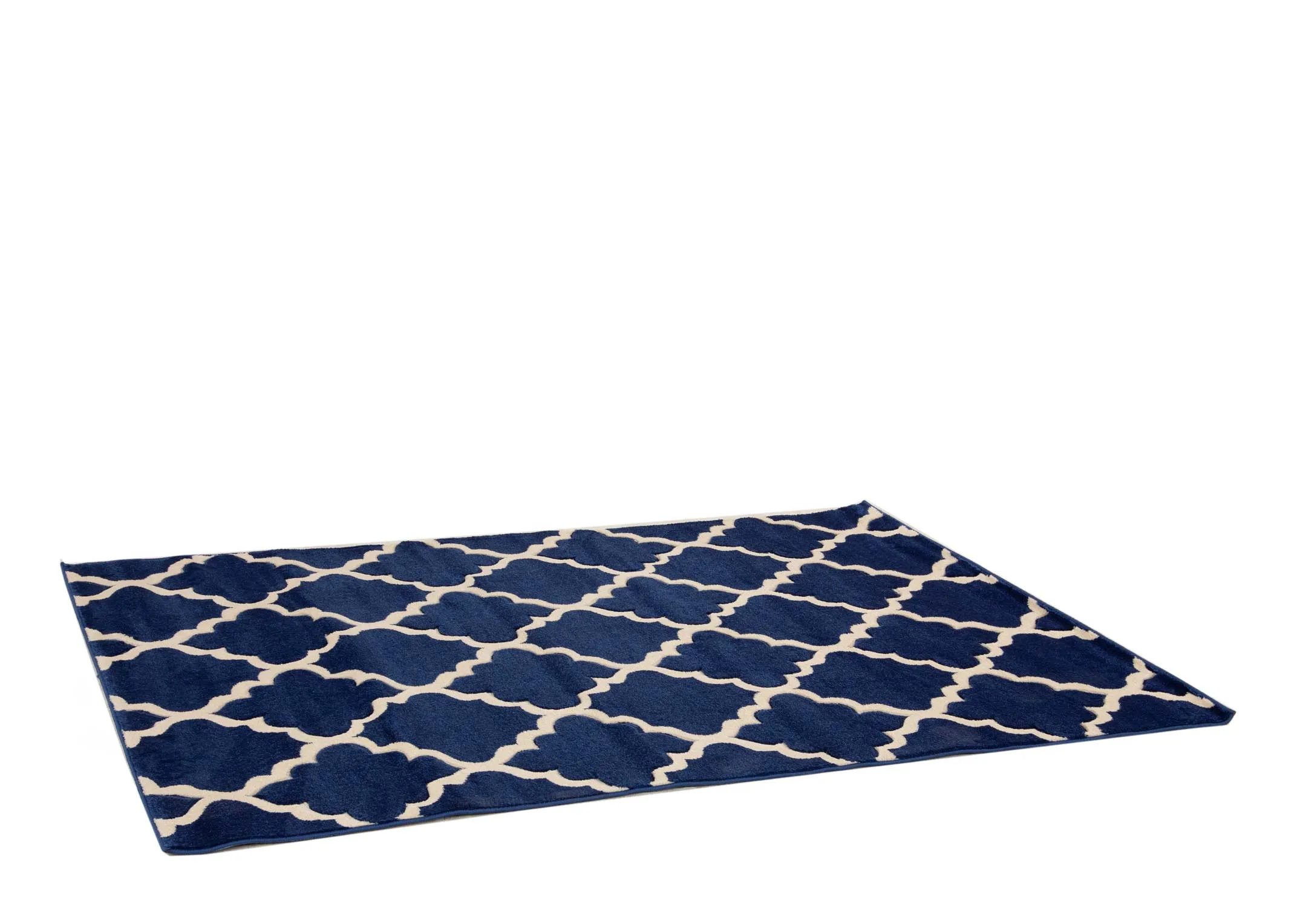 A navy blue rug with cream trellis design from EZ Livings Delia range. Angled view