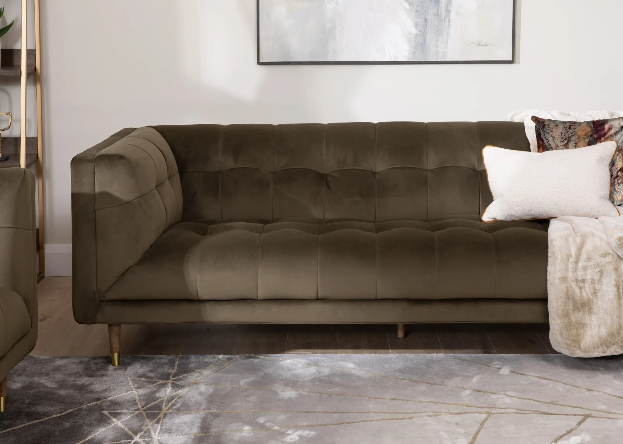A lifestyle image of the Grace green velvet sofa with a closeup detail shot of the tufted fabric detail