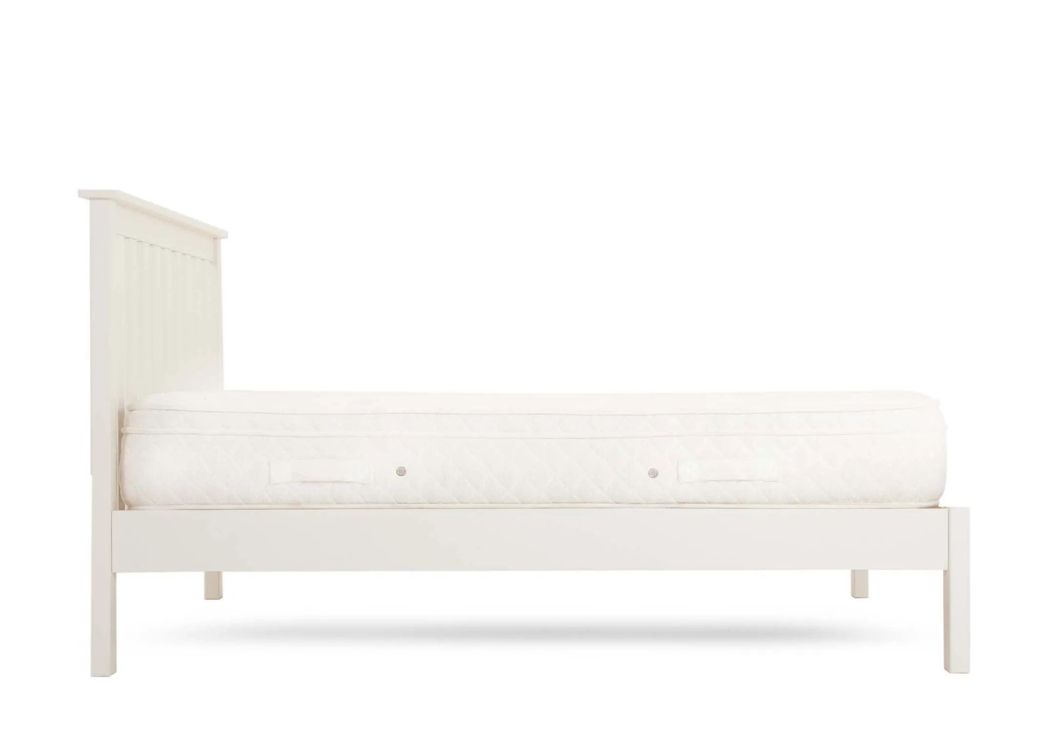 A white pine wood 3ft bedframe from EZ Living Furnitures Atlas range. Side view of space beneath bed