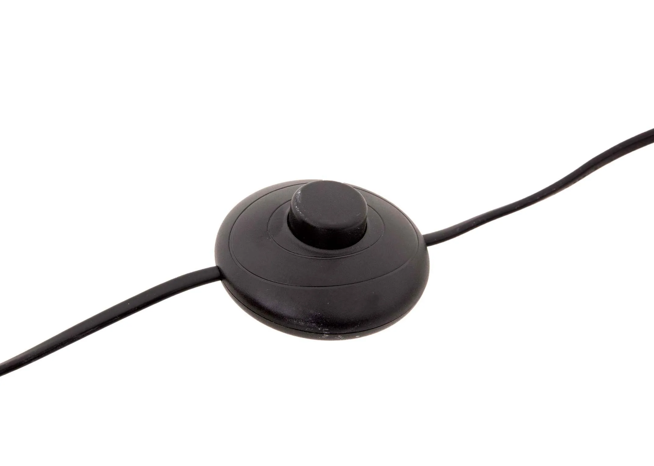 A black metal tripod floor lamp with white pleated shade from EZ Livings Starlette range. Closeup of round switch