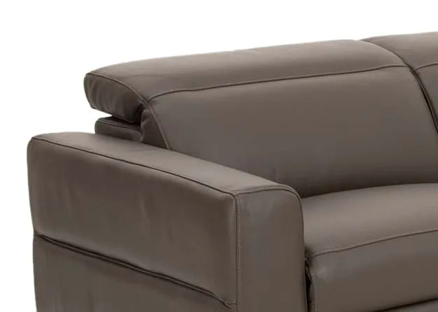 A grey leather electric reclining corner chaise from EZ Livings Vancouver range. Closeup of tilted head rest