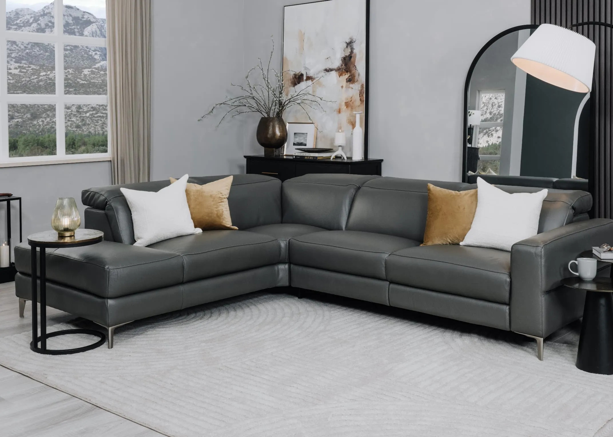 A lifestyle image of the Vancouver sofa with toko tables and Chrisley mirror