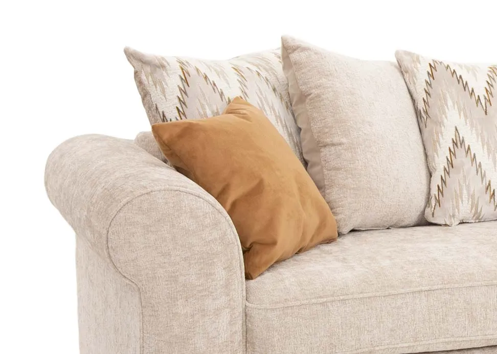 An extra large cream pillowback sofa with 5 accent & 2 scatter cushions from EZ Livings Hayden range. Closeup of curved arms