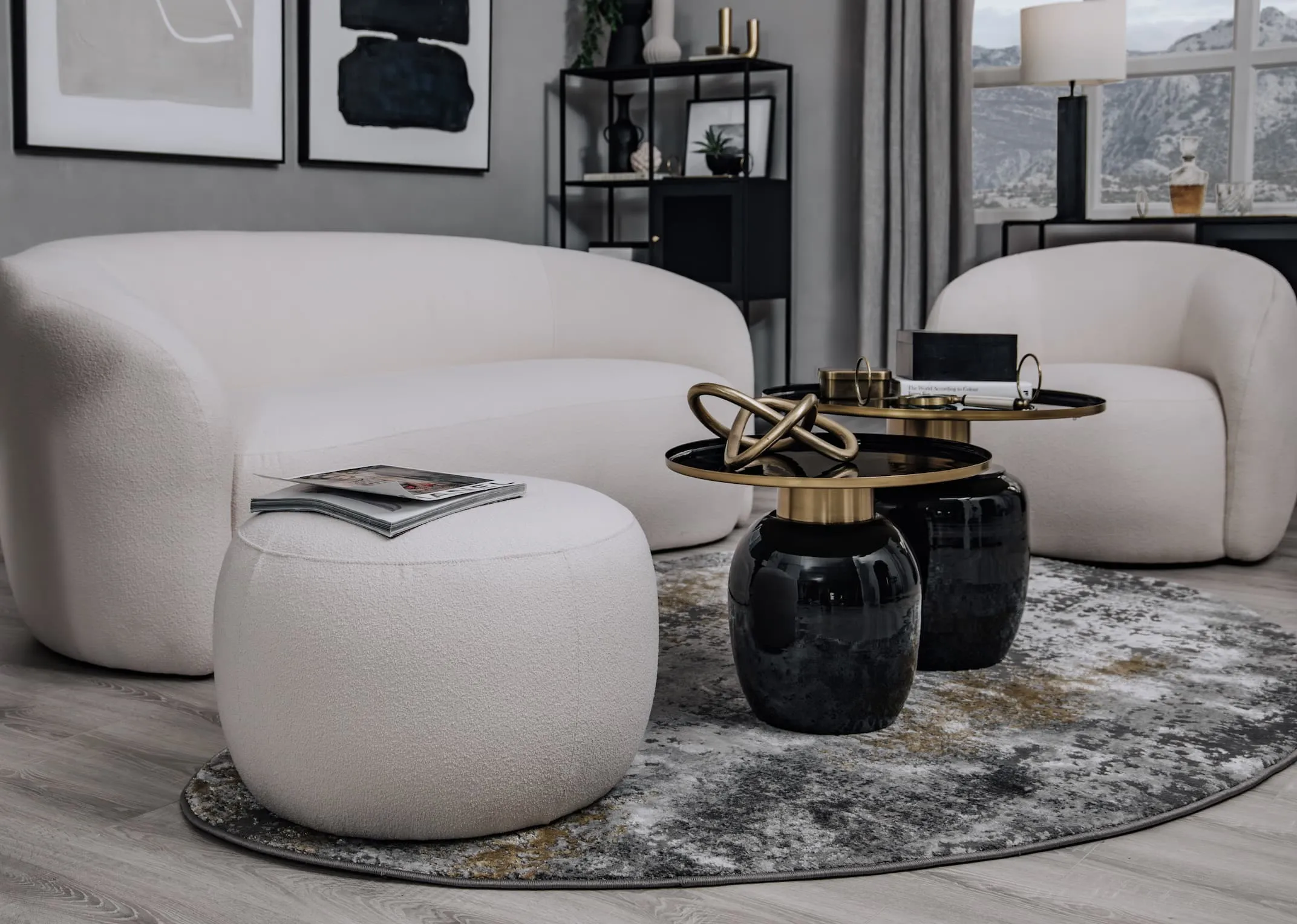 A lifetsyle image of the Florance footstool with matching sofa and accent chair and Massimo tables