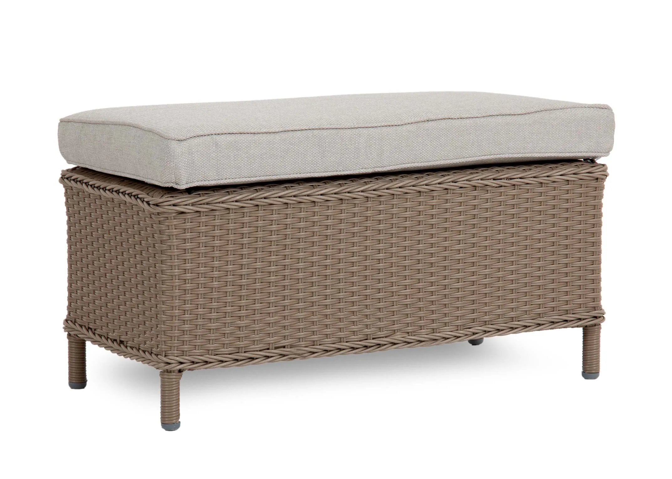 A wicker corner garden sofa with a square dining table & 2 ottoman benches from EZ Livings Marbella range. Angled view of glass top table