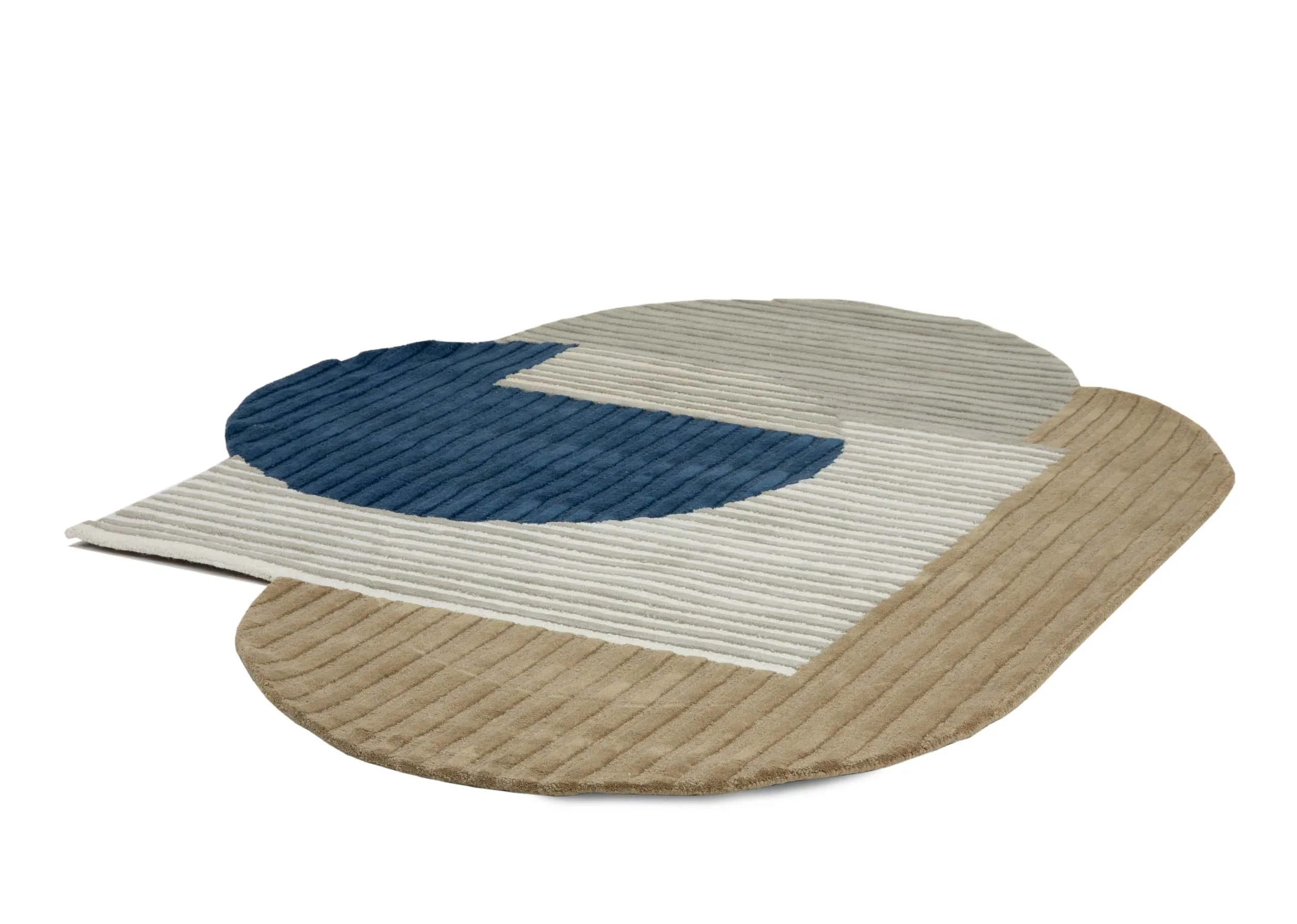 A green grey and navy abstract shaped rug from EZ Livings Geo range. Angled view