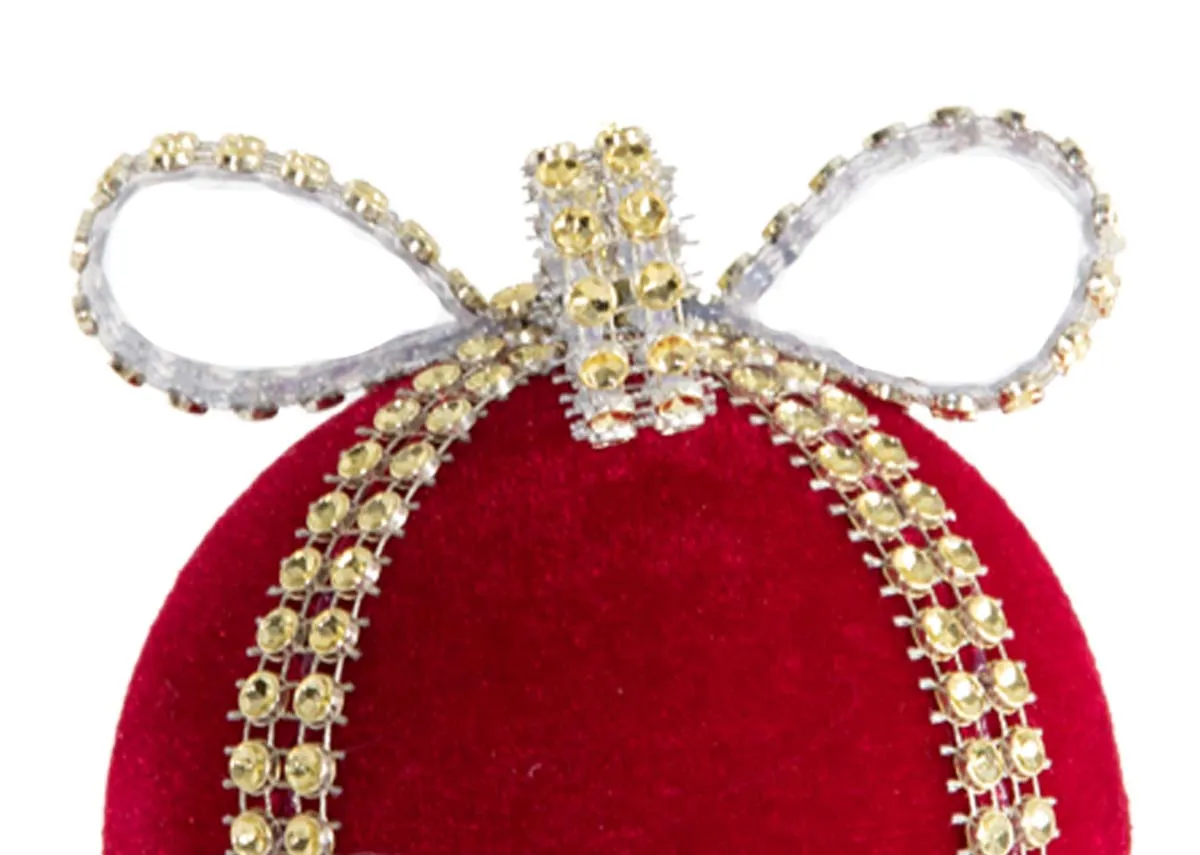 A bright red velvet bauble from EZ Livings Christmas range. Closeup of gold diamante bow.