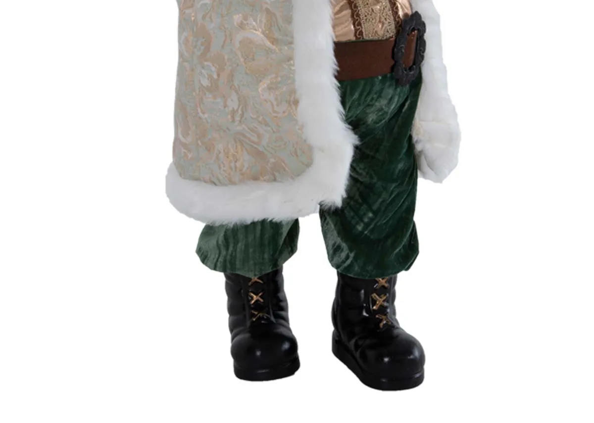 A white & green santa figurine from EZ Livings Papa Noel range. Closeup of boots
