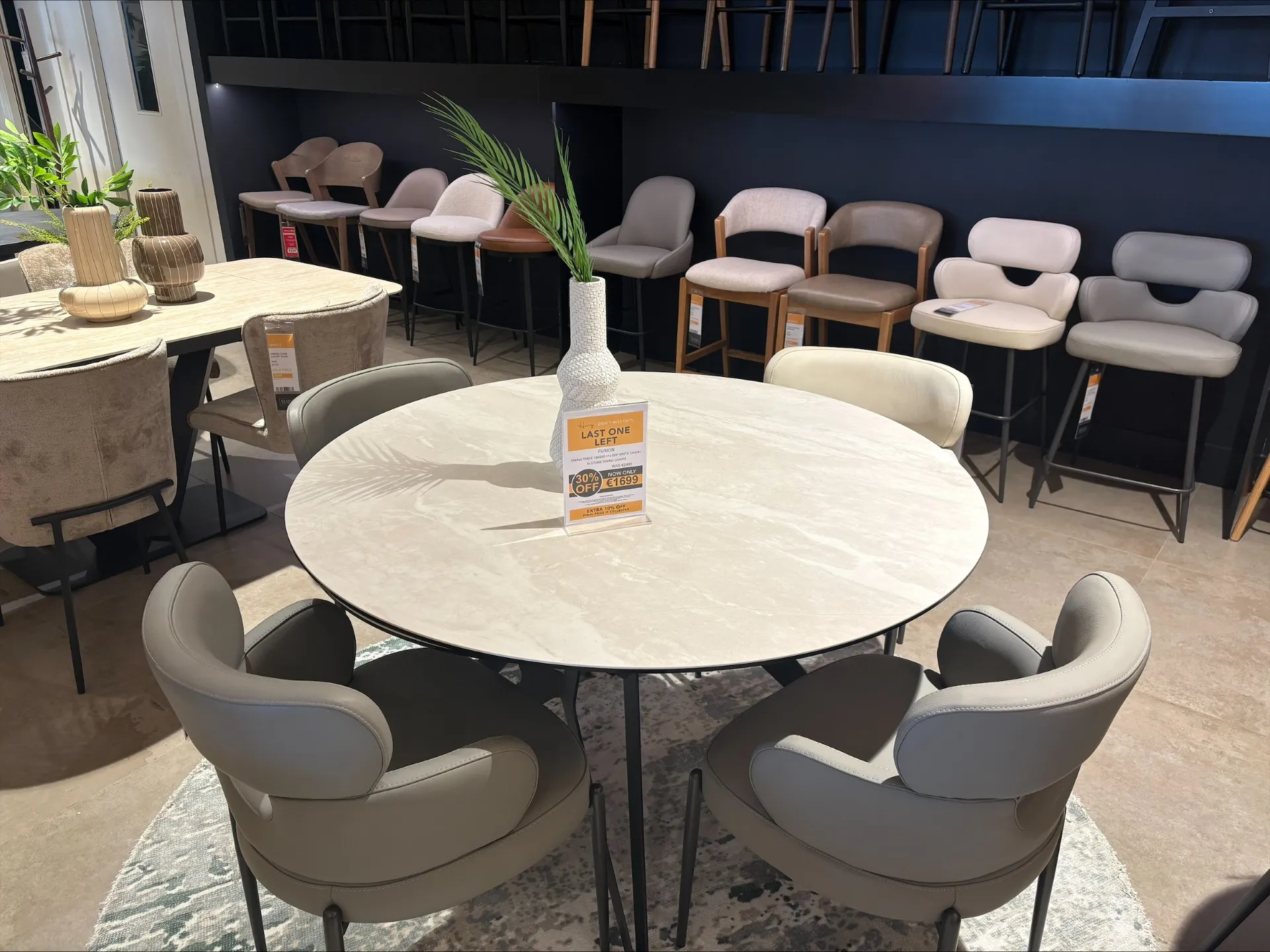 Fusion -130cm-200cm Ceramic Extendable Dining Table & 4x Off White Faux Leather Dining Chair (Cavan Floor Model)