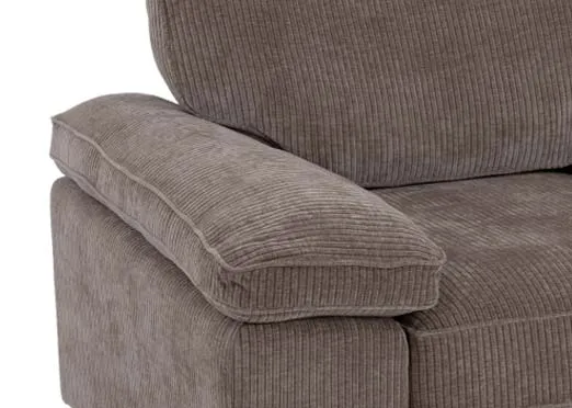 A beige cord fabric armchair from EZ Livings Westport range. Closeup of padded armrest.