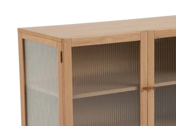 An oak 3 door sideboard with glass front from EZ Livings Gallina range. Front view of sideboard