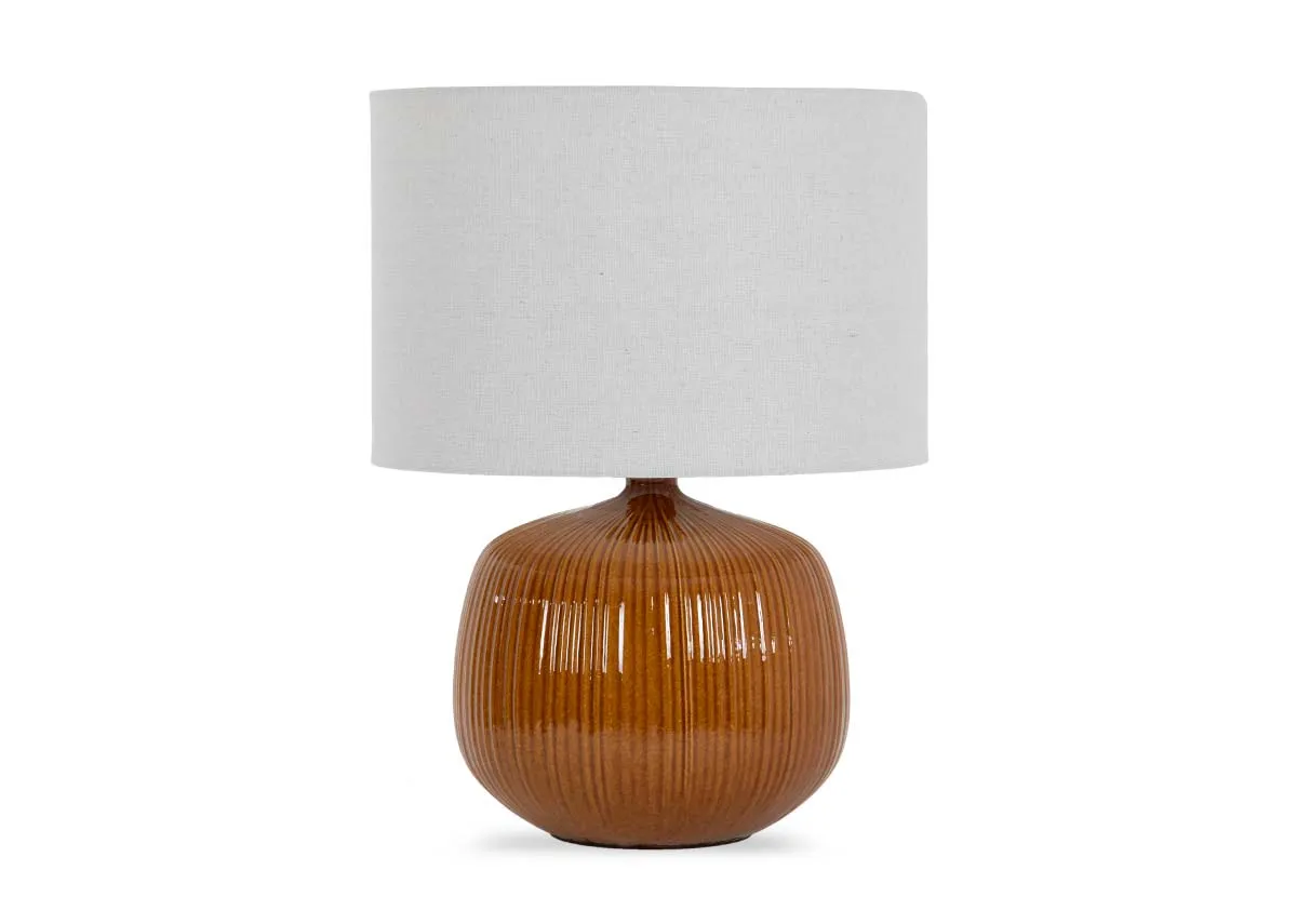 A glossy brown table lamp with white shade from EZ Livings Bann range. Front view