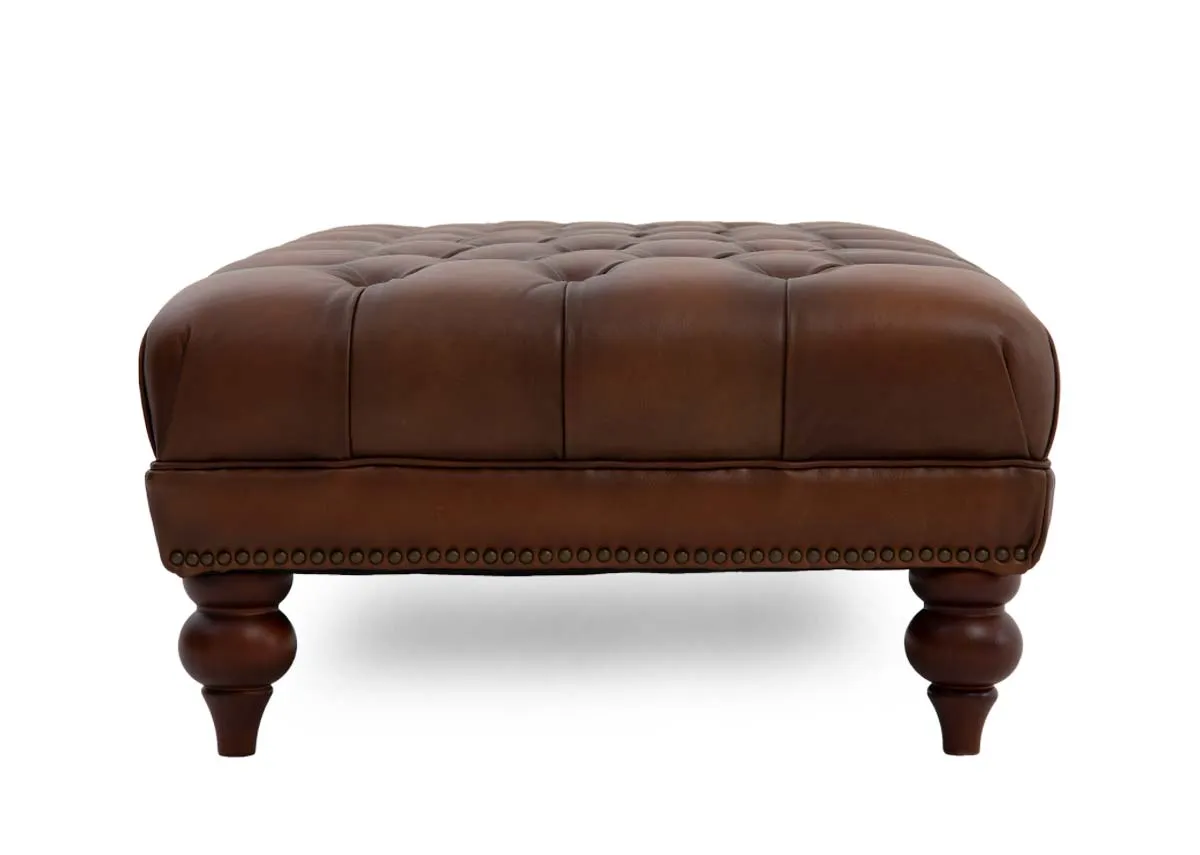 A tufted button brown leather footstool from EZ Livings Adare range. Side view
