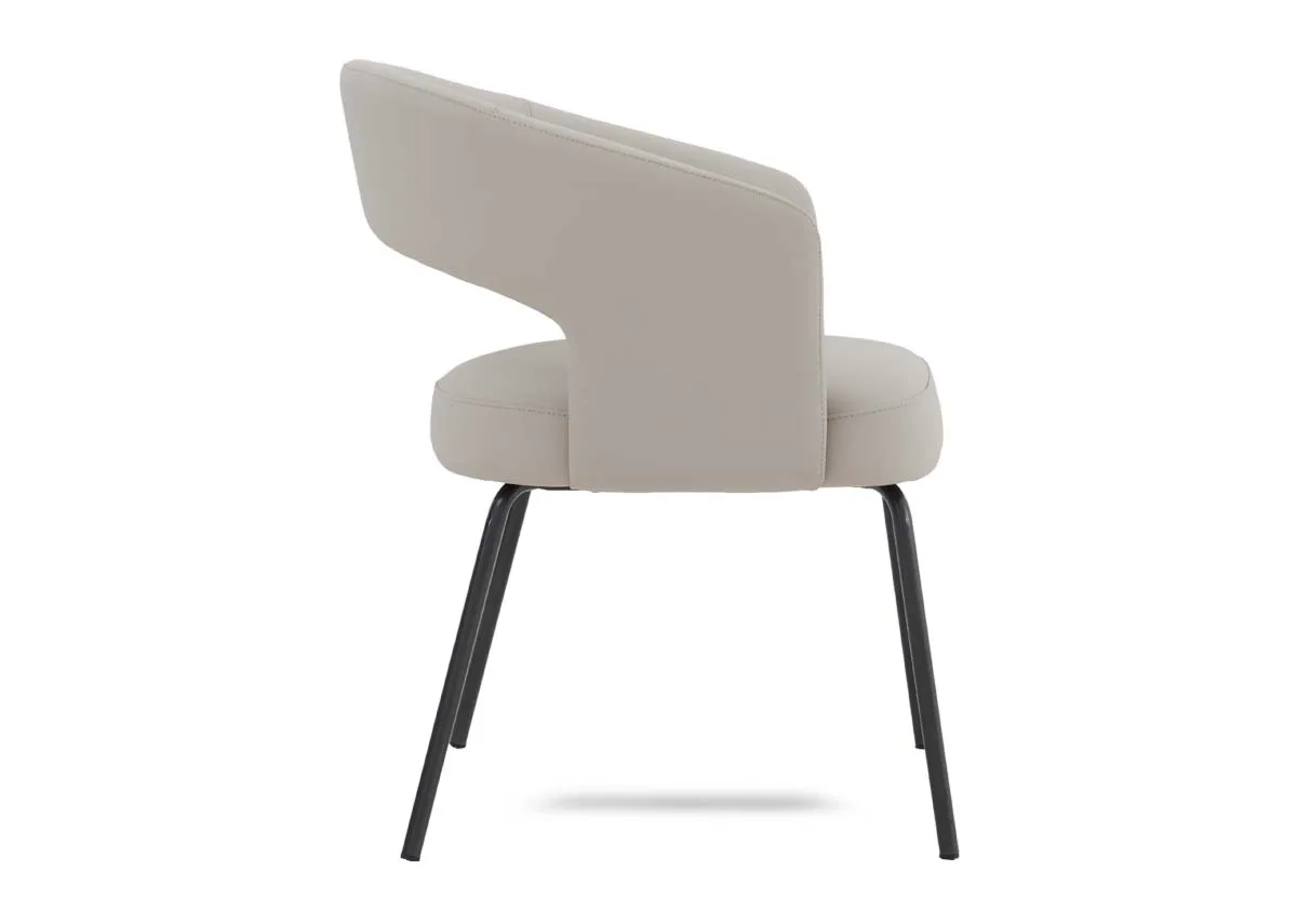 A white leather dining chair with metal legs from EZ Livings Matteo range. Side view
