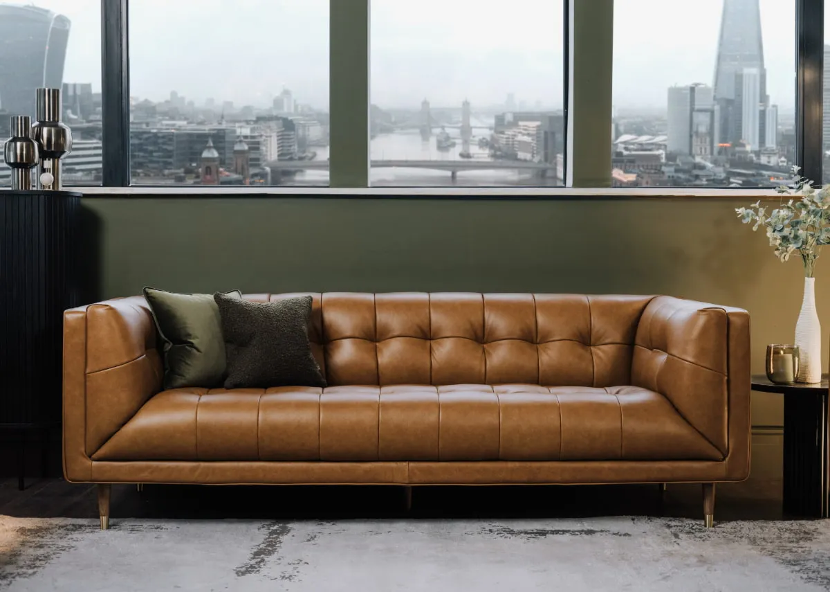A lifestyle image of the Grace 3.5 seater sofa with cityscape backdrop