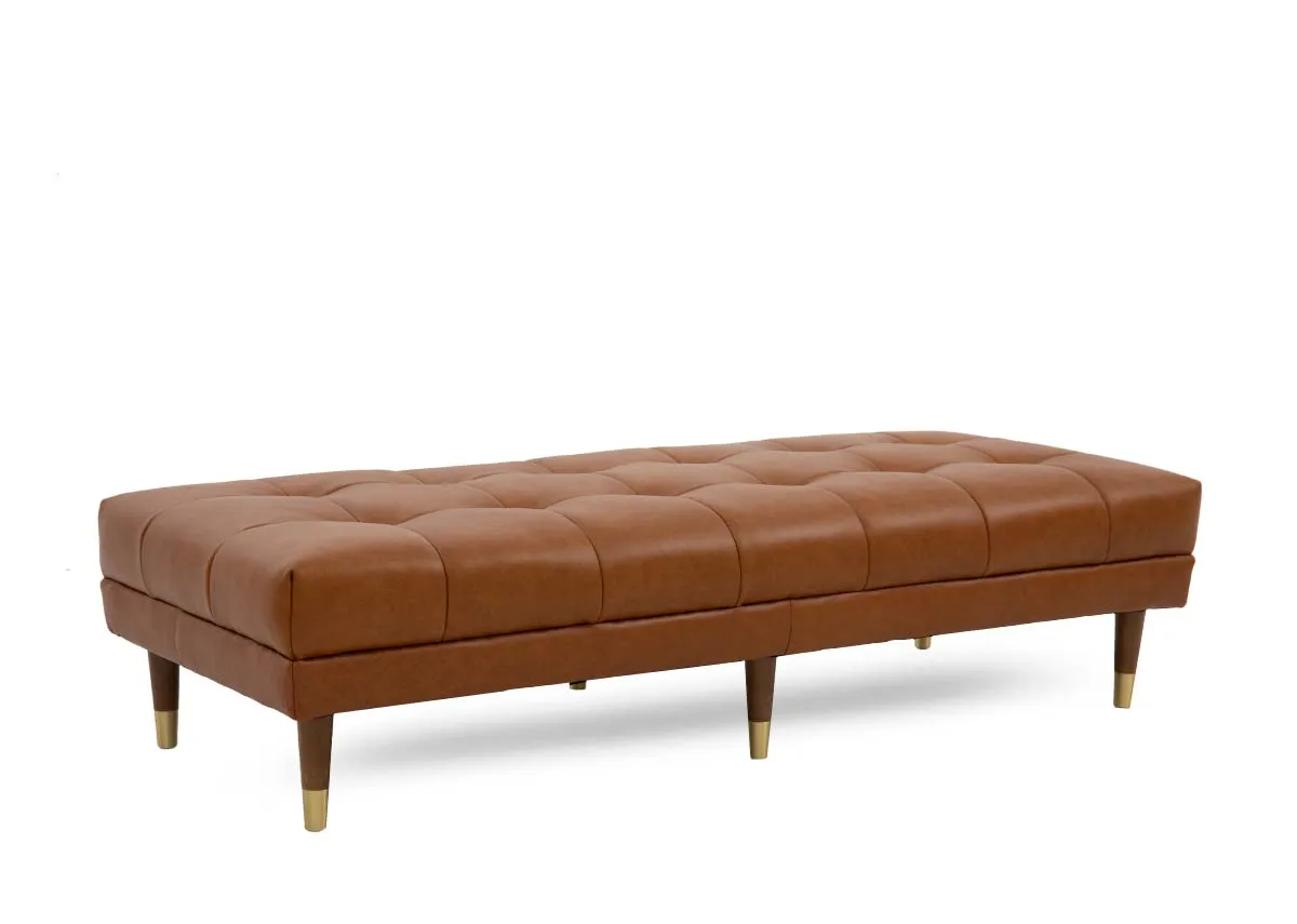 A tan leather footstool with button detail from EZ Livings Grace range. Angled view.