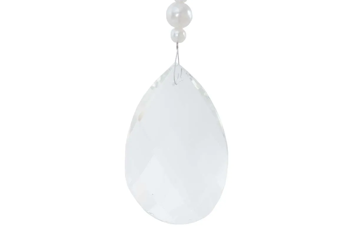 A white pearl garland with crystal pendant from EZ livings Christmas range.Closeup of pendant