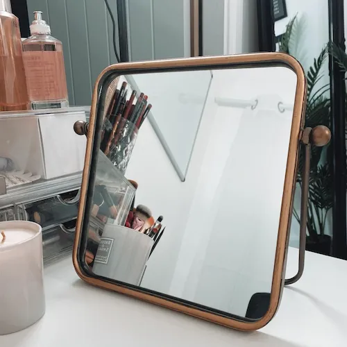 Black full lenth mirror with bronze hand Optimal Mirror from EZ Living Furniture.