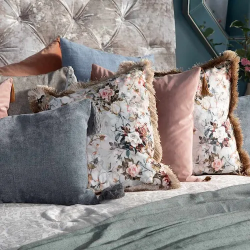 Multiple decorative cushions from EZ Living Furniture.